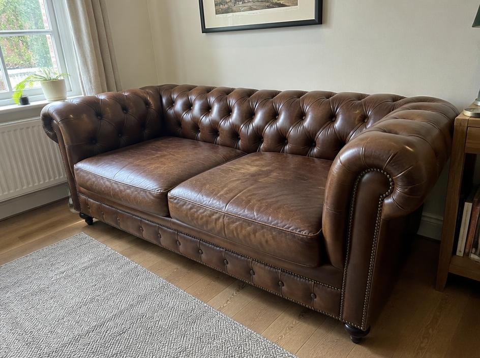 Brown leather Chesterfield sofa
